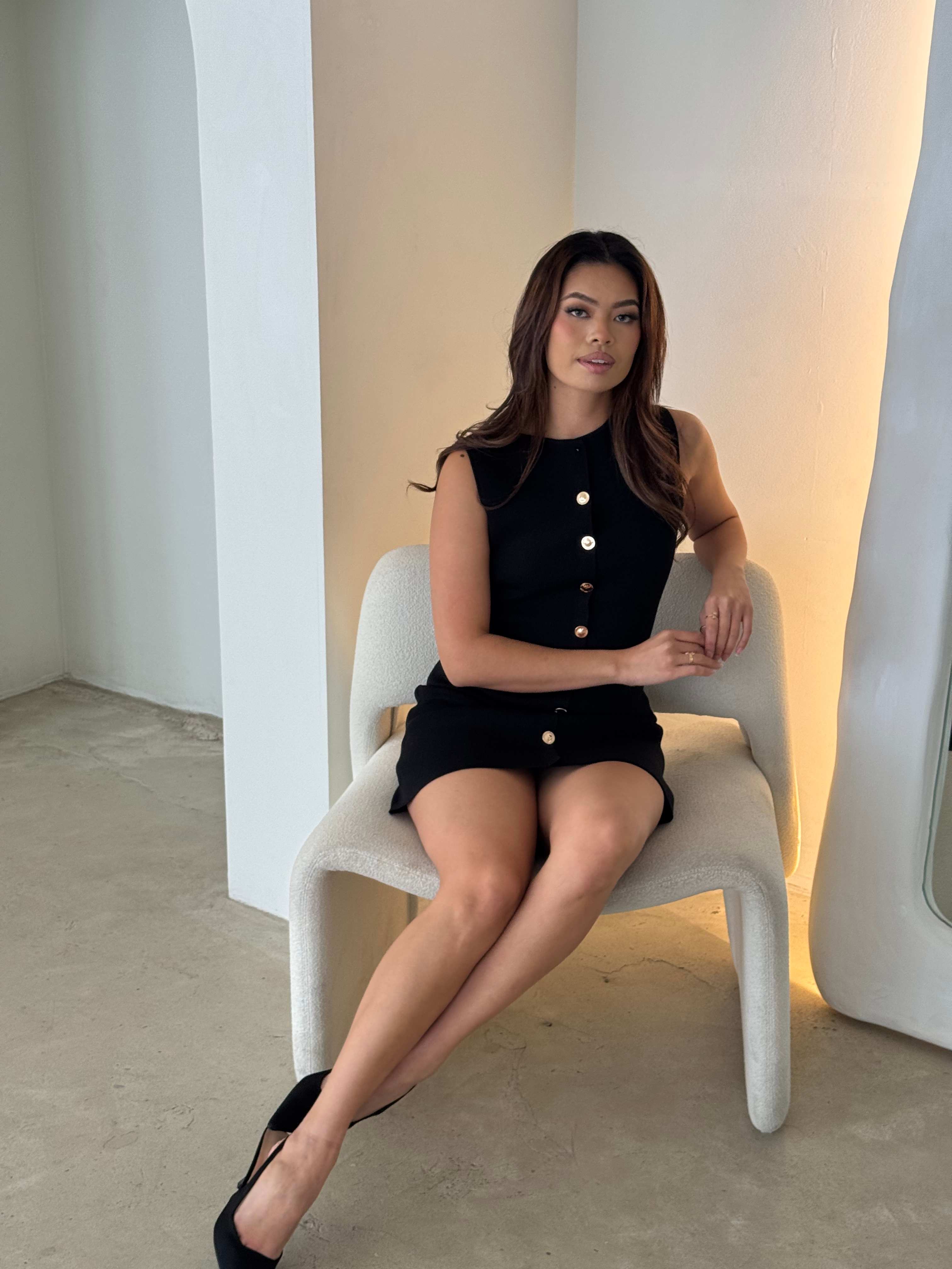 Elegant Black Sleeveless Dress With Metallic Button Accents